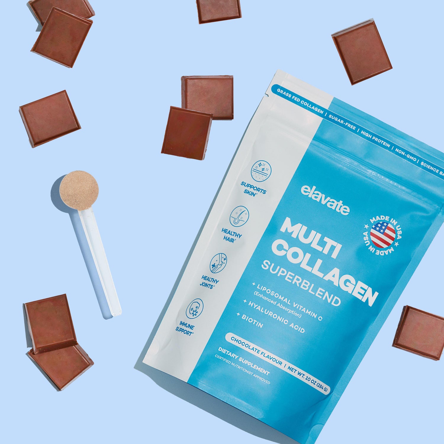 Blue pouch of elavate Multi Collagen Superblend (chocolate flavour) with scoop and chocolate squares