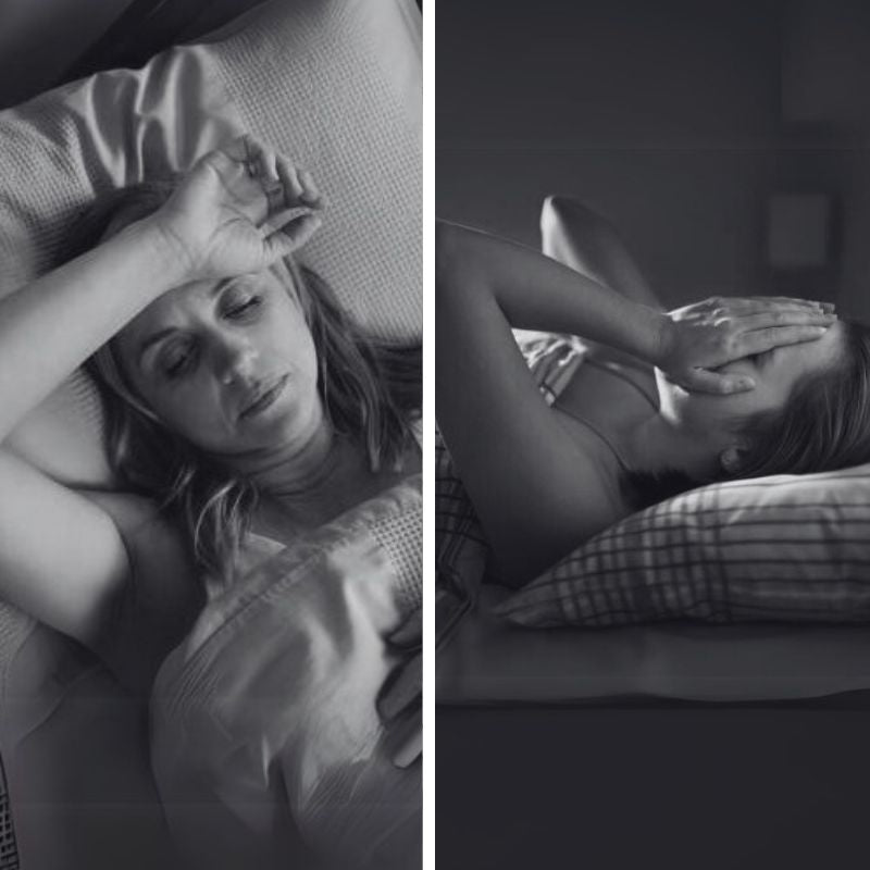 Two women lying in bed, each holding her head and appearing sleepless or distressed