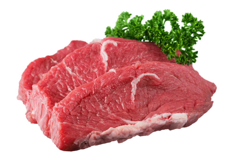 Two raw beef steaks with parsley garnish