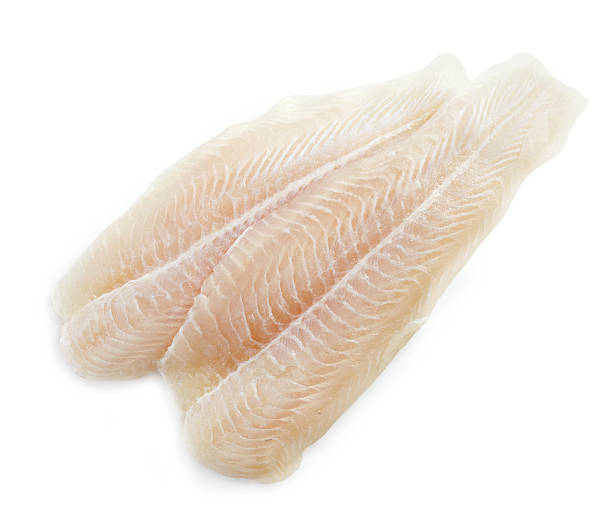 Two raw white fish fillets, skinless and boneless, on a white background